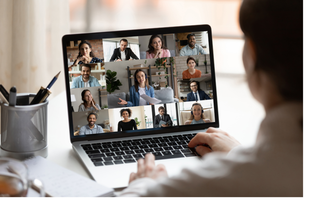 People participating in a virtual meeting on a laptop.